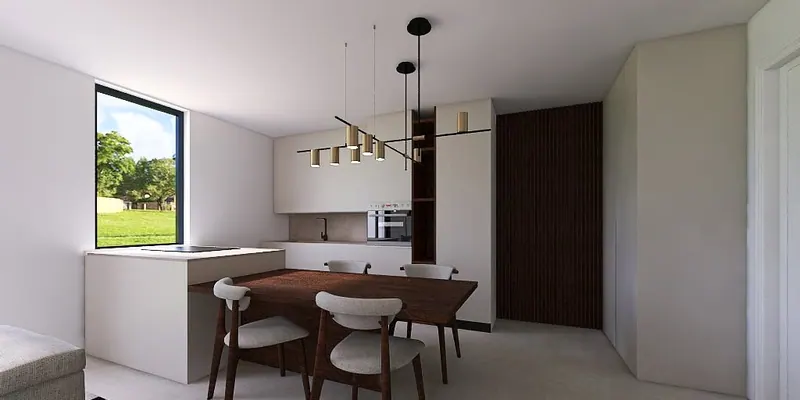 Cucina e zona pranzo con tavolo in noce