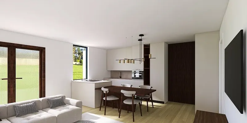 Lo stesso ambiente: soggiorno aperto verso la cucina